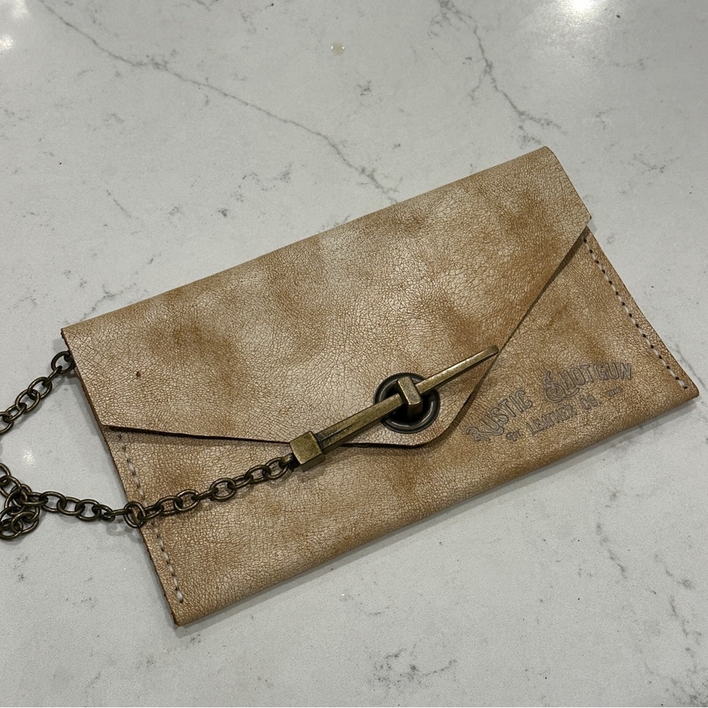 Elegant Tan Leather Wristlet with Chain Detail